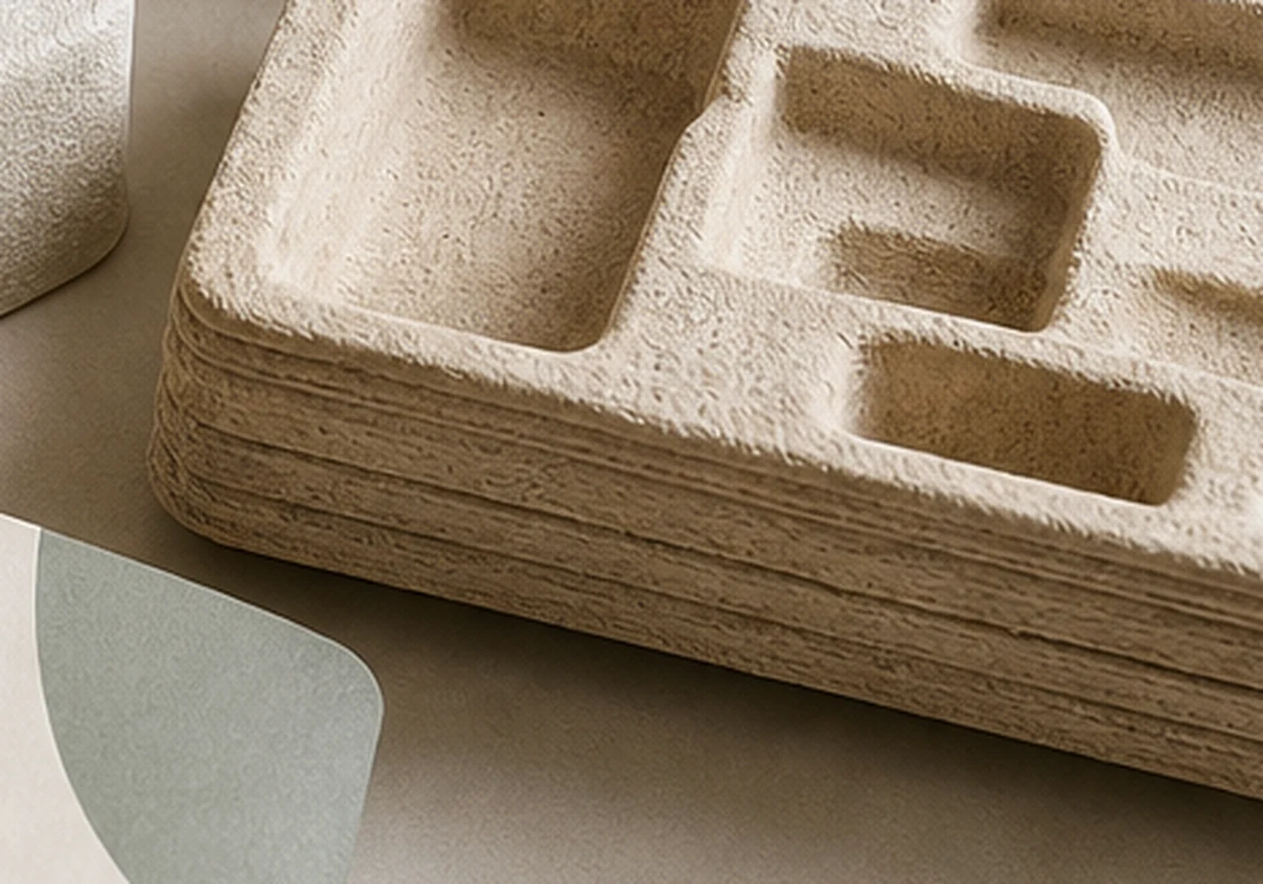Fiber molded pulp tray packaging with formed protective cavities