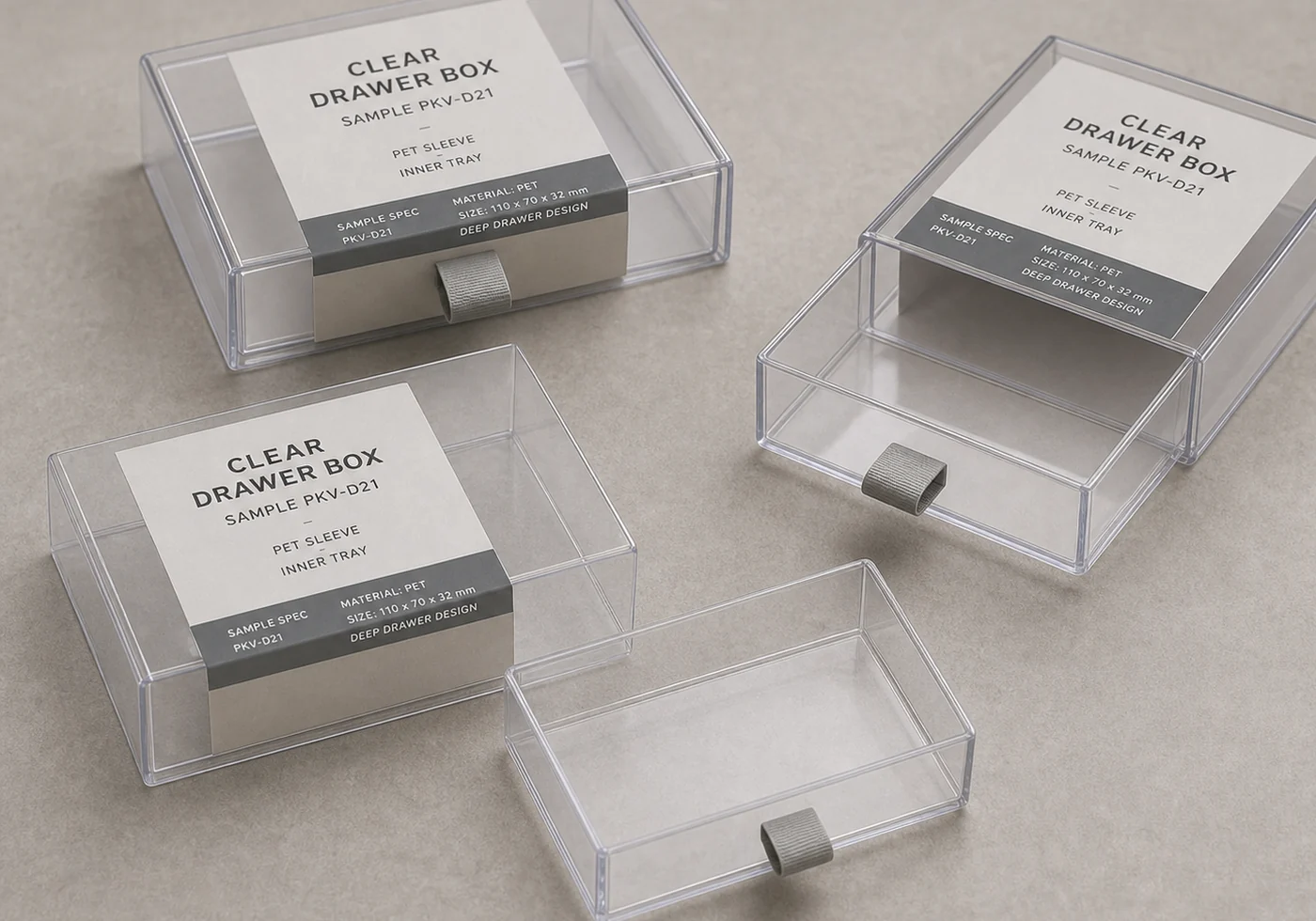 Clear plastic drawer box group with PET sleeves, pull tabs, and printed insert cards