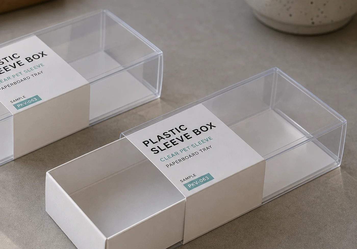 Clear sleeve packaging sample with printed insert card and paperboard tray detail
