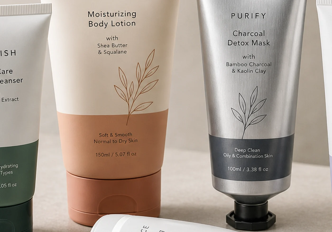 Tube packaging and closure components beside branded box packaging